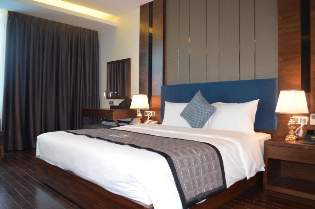 Eagle Hotel Dai Tiet Bagian luar foto