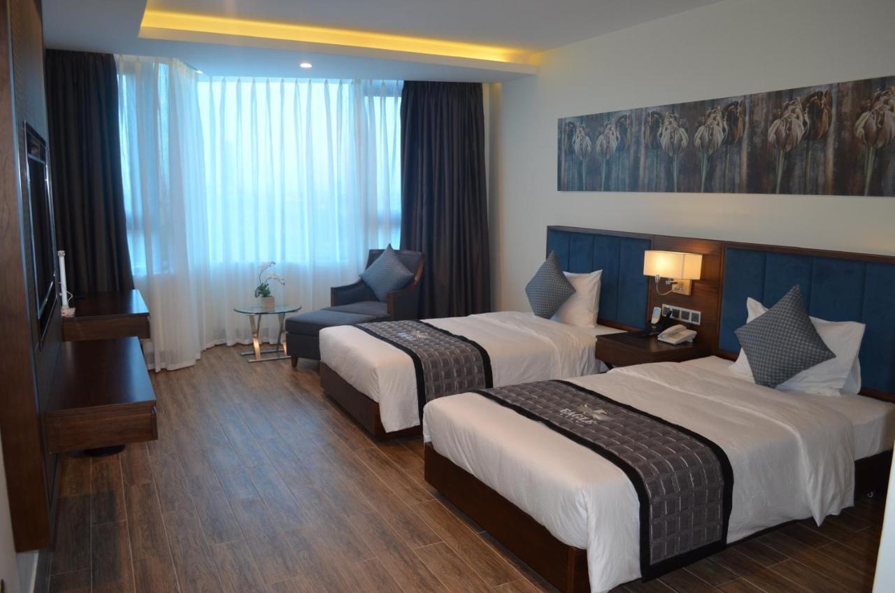 Eagle Hotel Dai Tiet Bagian luar foto
